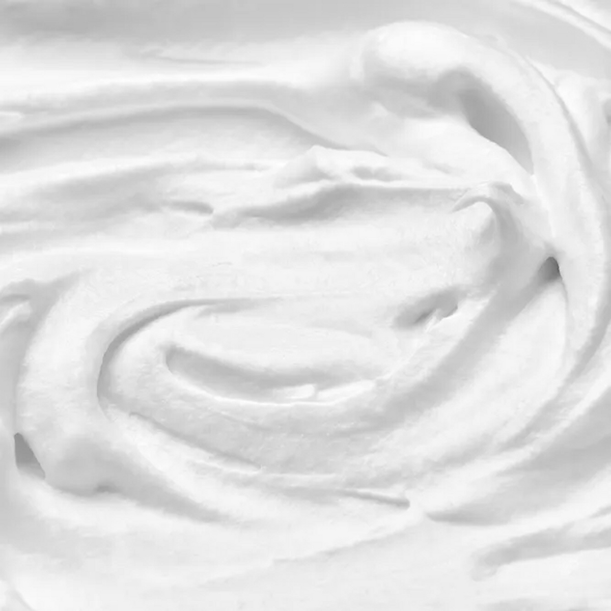 Close-up texture of Warrior Kingdom shaving cream — rich, smooth lather